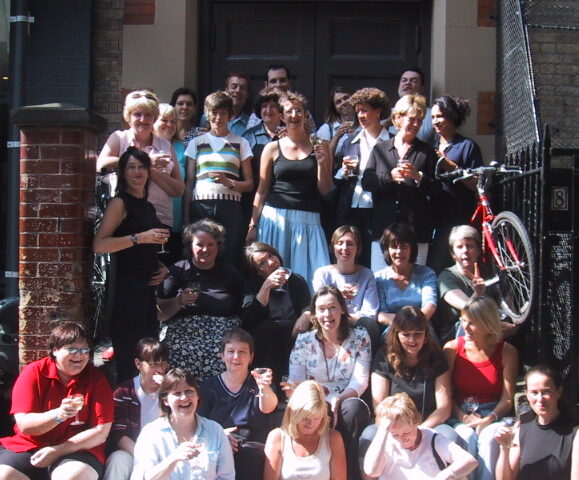 25th Staff pic on the steps 2003